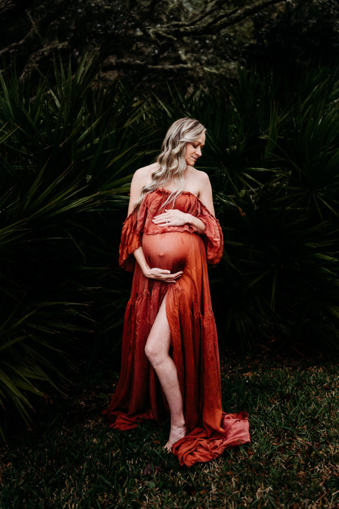 Family Photographer, pregnant woman in long flowing dress